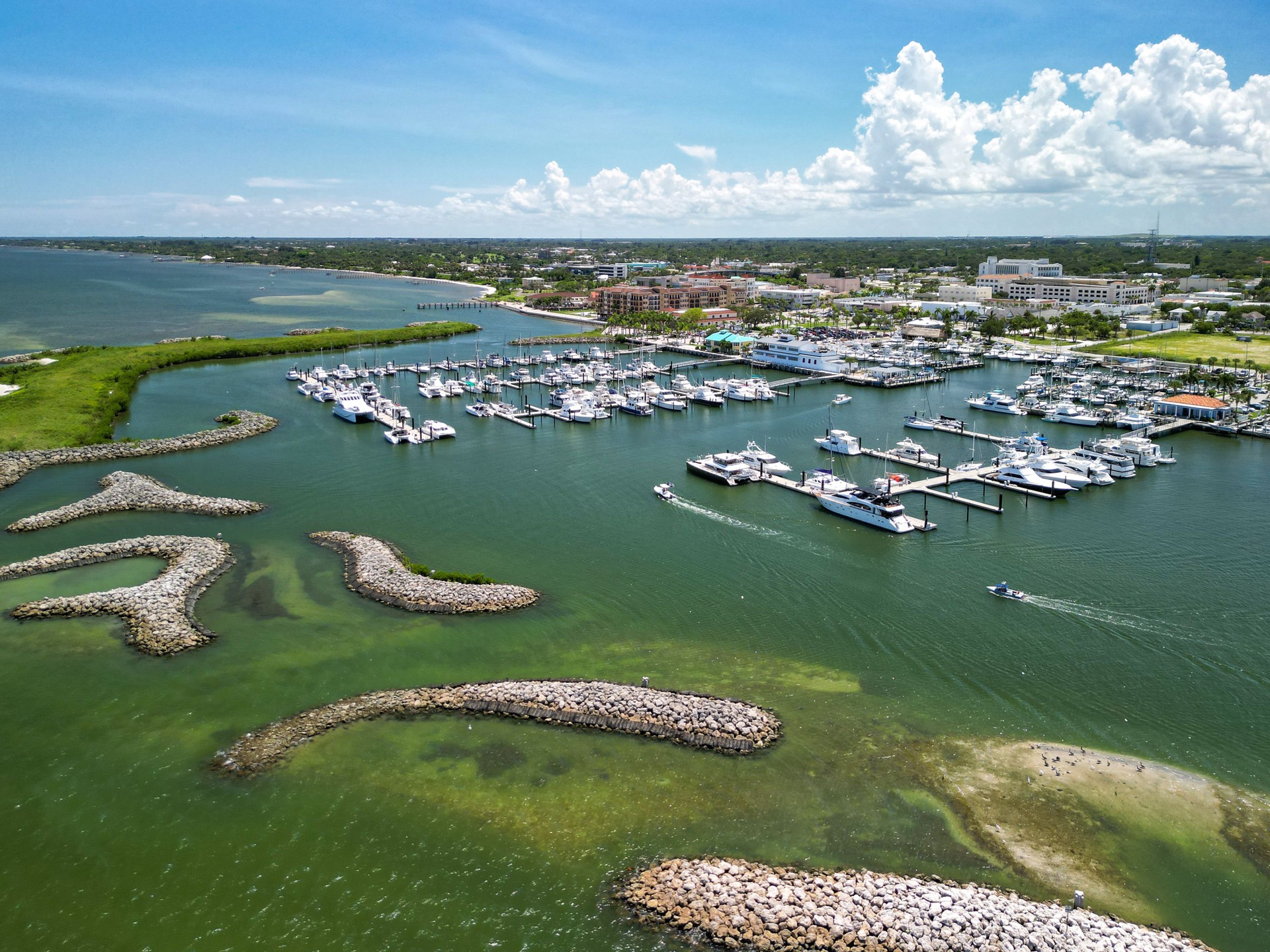 Rock jetties protecting the downtown Fort pierce boat harbor on the Treasure Coast of Florida in St. Lucie County